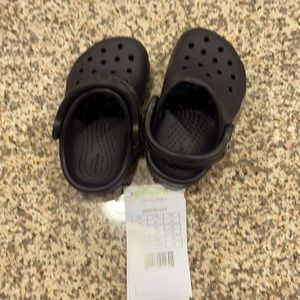 New baby’s CROC in black with tag. Size 4C